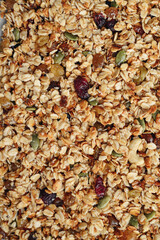 Gluten-free oat granola with nuts and berries.