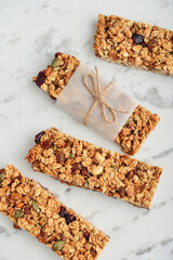 Gluten-free oat granola bars with nuts and berries.