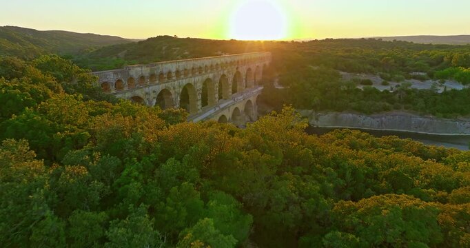 Aerial view of Pont du Gard, ancient Roman aqueduct on Gardon River. Tourist attraction of France