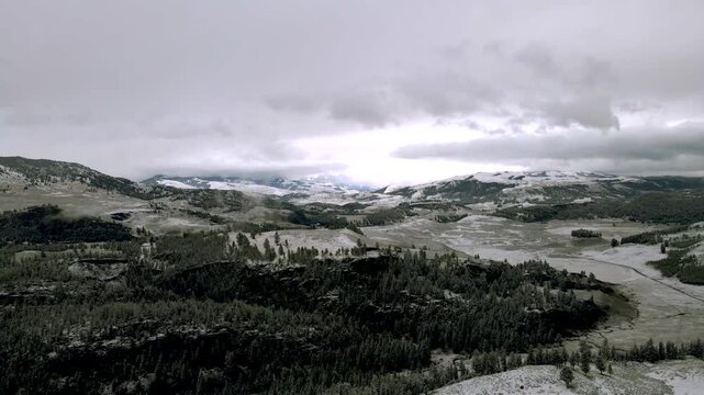 Aerial view of a landscape in Yellowstone Park in winter under the snow