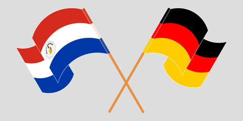 Crossed and waving flags of Republic of Paraguay and Germany. Vector illustration