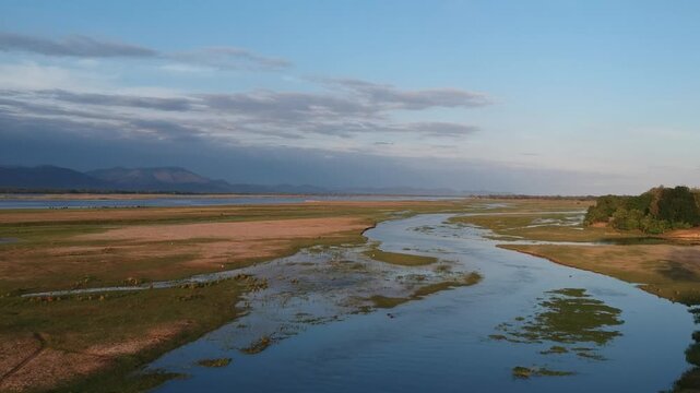 Scenic view of the Zambezi River with the mountains of the Zambian escarpment in the background, Mana Pools