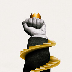 Raised hand with a clenched fist with a crown and a spiral staircase.
