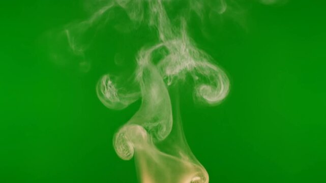 A dense, realistic plume of white smoke rising steadily against a chroma key green screen. Perfect for atmospheric effects, cinematic transitions, and professional VFX compositing. High-quality 4K res