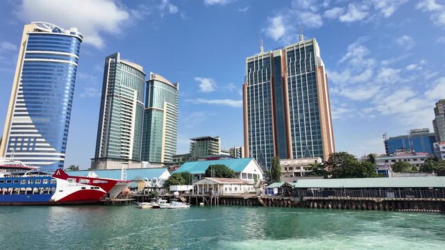Dar Es Salaam, Tanzania: Panoramic footage of waterfront area in Dar Es Salaam downtown, capital city of Tanzania with skyline. Shot on the ferry to Zanzibar. 
