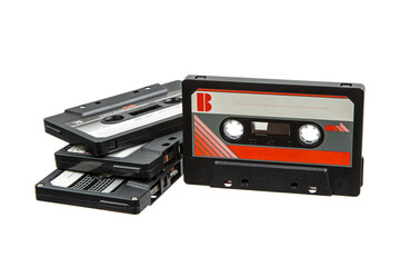 Naklejka premium Stack of vintage audio cassette tapes isolated on a white back