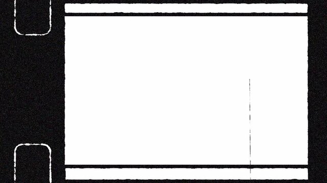 Sharp black border window showing a frame Super 8 film with Film Light Leak Grain and Real 8mm Film Light Leaks, captured from a real film scan of a Real 8 mm format and Real 8 mm film.. 4K Video