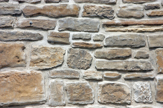 Closeup of a stone wall texture background