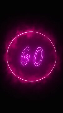 Pink Neon Circle with the Word GO in Script Font Glowing Against a Dark Background with Smoke