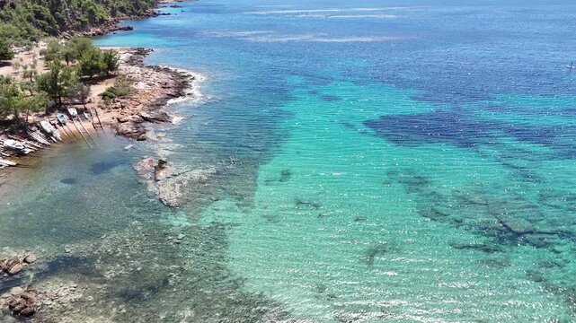 Vertical video of clear turquoise water on Thasos coast