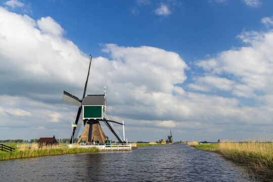 Historic Dutch windmills along Molenkade in Groot Ammers