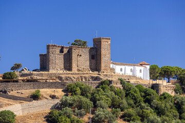 Naklejka premium Cortegana Castle and church in Andalucia, Spain