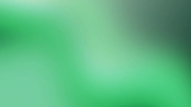 Abstract green background with soft gradient and light effects.