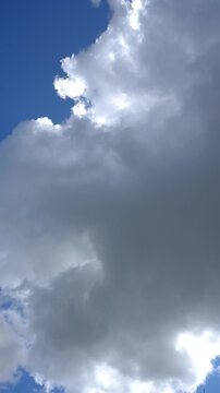 Timelapse of cumulus clouds in a blue sky