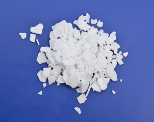Potassium hydroxide KOH, and is commonly called caustic potash.