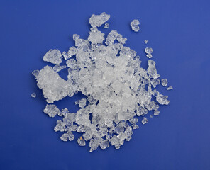 Cadmium nitrate powder on beige background