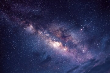 Obraz premium Starry night sky reveals stunning cosmic beauty over a tranquil landscape illuminated by countless stars and the Milky Way, inviting wonder and exploration in the night