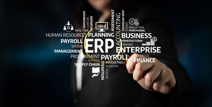 A business professional explores crucial concepts in enterprise resource planning (ERP) with a creative word cloud. This image symbolizes strategic decision-making and efficiency. Tessel