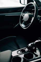 Steering wheel and gearbox of a car