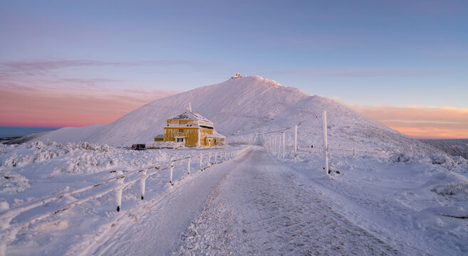 landscape under Sniezka mountain during winter sunset in Karkonosze mountains in Poland