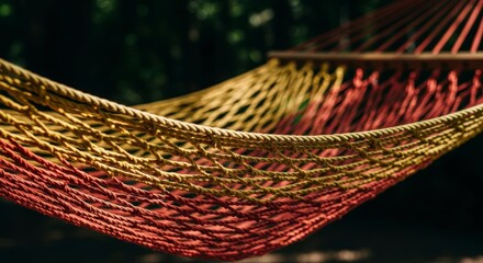 Obraz premium Vibrant woven hammock outdoor furniture relax.