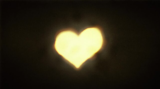 Heart love symbol animation with risograph grain and a soft glow effect