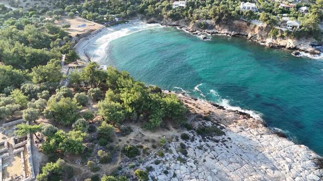 Vertical video of turquoise bay and ancient ruins