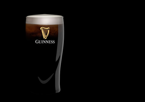 A Perfect Pint of Guinness Beer with Space for Text