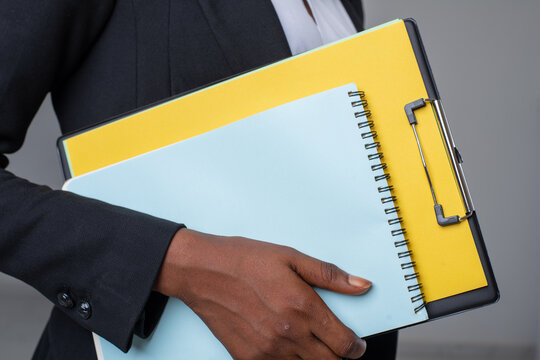 businessman holding a folder
