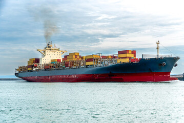 A ship transporting containers across the Atlantic Ocean.