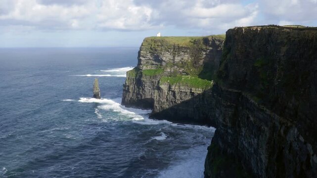 The famous Cliffs of Moher, a tourist viewing location of spectacular sea cliffs in the Burren region of County Clare, Ireland. O'Brien's Tower visible.