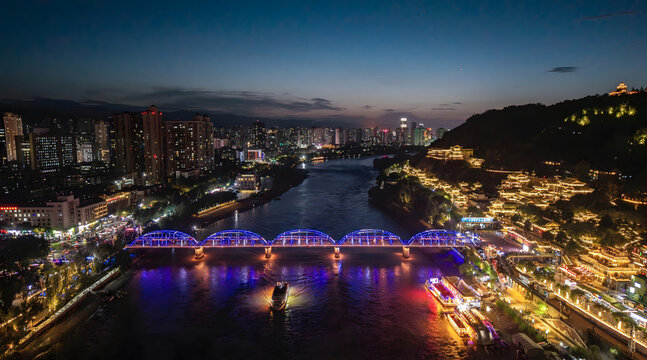 Lanzhou Night Scene - Illuminated Bridge Over River with City Skyline