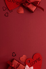 Valentines Day Flatlay with Hearts, Roses and Gifts on Red Background