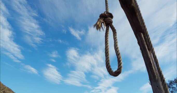 Gallows against blue sky Hanging rope as a way to punishment