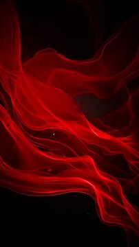 Fluid red ink creating abstract flowing lines over a black background, a dynamic animation for modern design and digital projects Vertical video