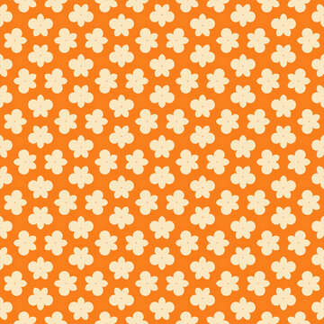 Seamless tropical pattern with orange hibiscus flowers and cream botanical leaves on a soft beige background. Elegant floral wallpaper design for summer textiles, wrapping paper, and home decor.