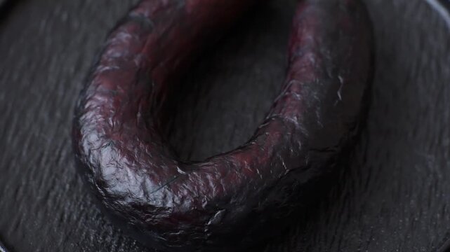 Homemade pork or beef sausage rings with garlic and spices. A homemade sausage ring as a food background for your design