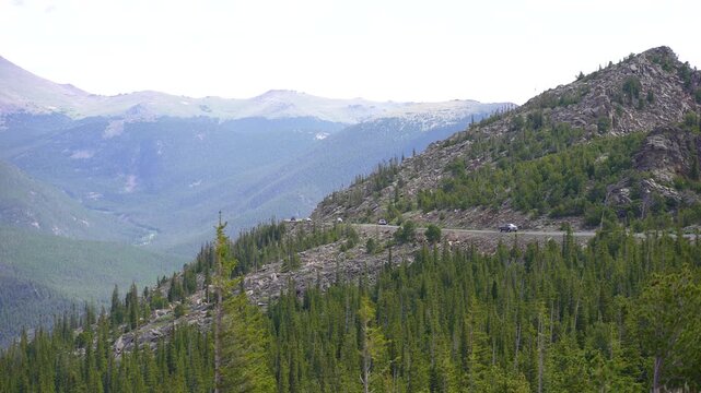 Cars passing through the most scenic drive of Trail Ridge Road in Rocky Mountain National Park, Colorado.