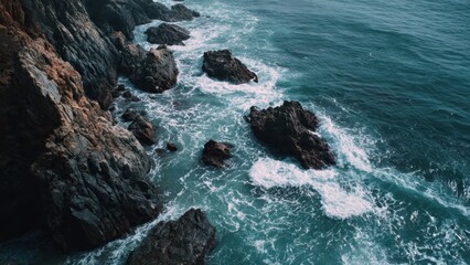 Ocean waves crashing on rocky coastline