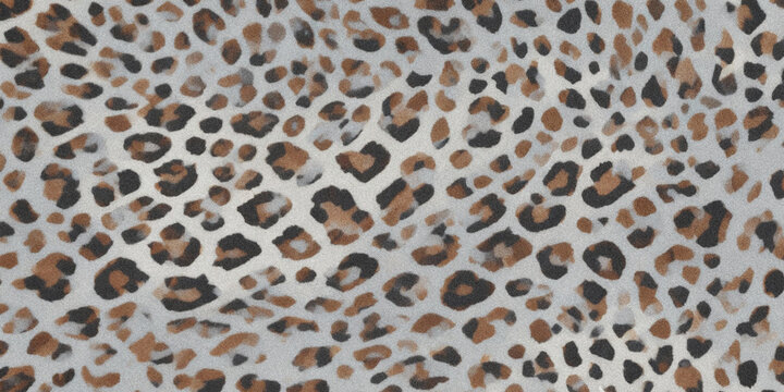 A close up view of a textured surface displaying a classic leopard or cheetah print pattern
