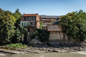 Fototapeta premium Beautiful old houses upon river Rioni in Kutaisi, Georgia