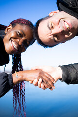 Two diverse  individuals having a  lovely spontaneous moment together.