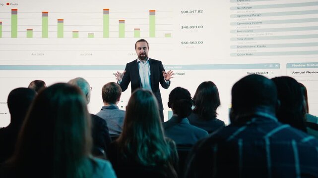Business forum presentation held at leadership event by entrepreneur, interacting with attendees and discussing about entrepreneurship tactics for development. International summit. Camera A.
