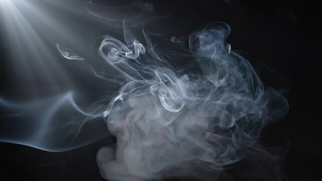 Wisps of ethereal smoke dance and swirl, illuminated by a dramatic light source