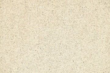 Fototapeta premium Light beige textured background with subtle speckles, ideal for design projects, presentations, or as a neutral backdrop for various visual applications