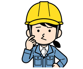 不満顔のヘルメットをかぶった現場監督の女性