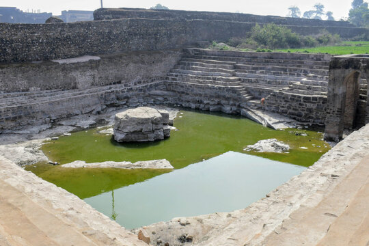 medieval stepped water tank near the outer fortifications of rohtasgarh fort, bihar