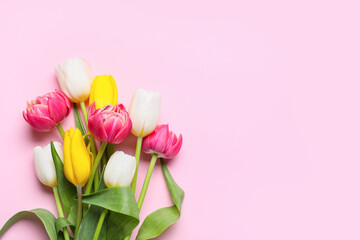Obraz premium Bouquet of beautiful tulip flowers on pink background