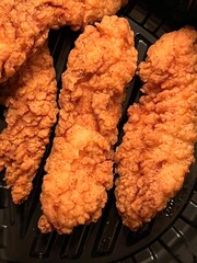 Chicken tenders in a plastic container