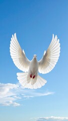 White Dove Soaring in a Bright Blue Sky with Clouds.
